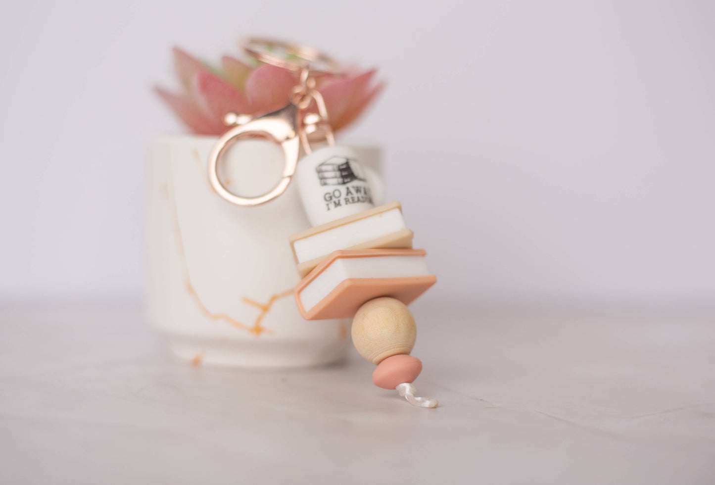 Go Away I’m Reading Keychain – Book Lover Accessory